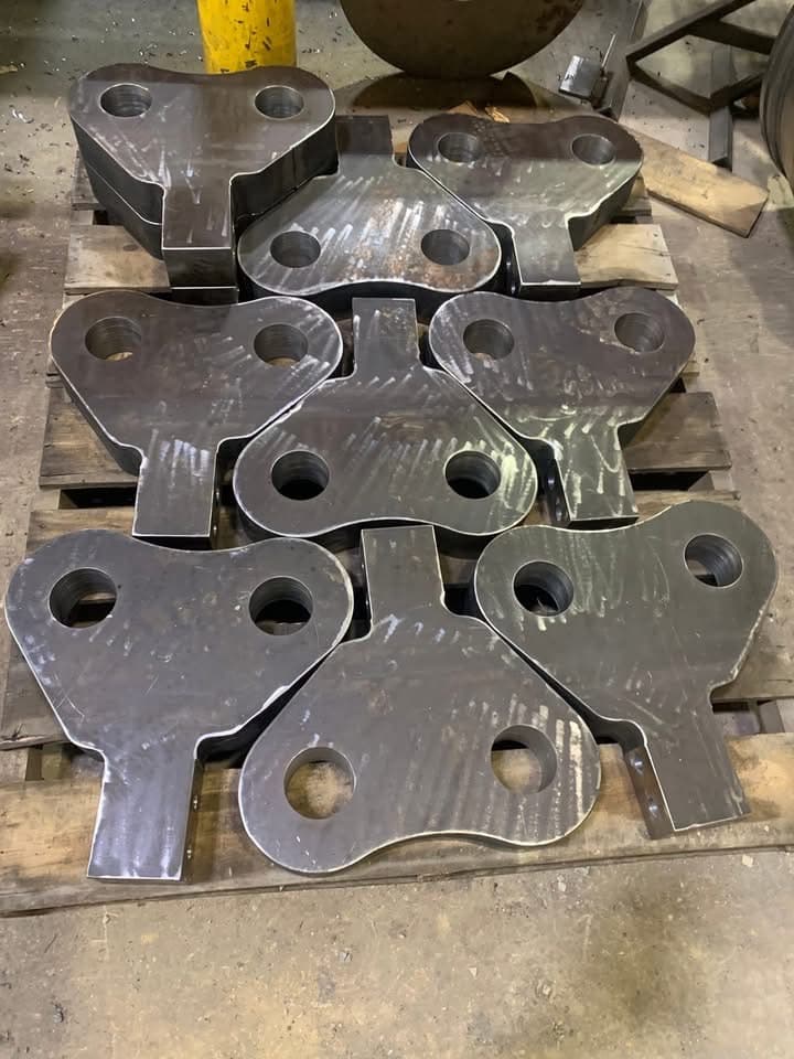 Plasma-cut hammer blanks on a pallet